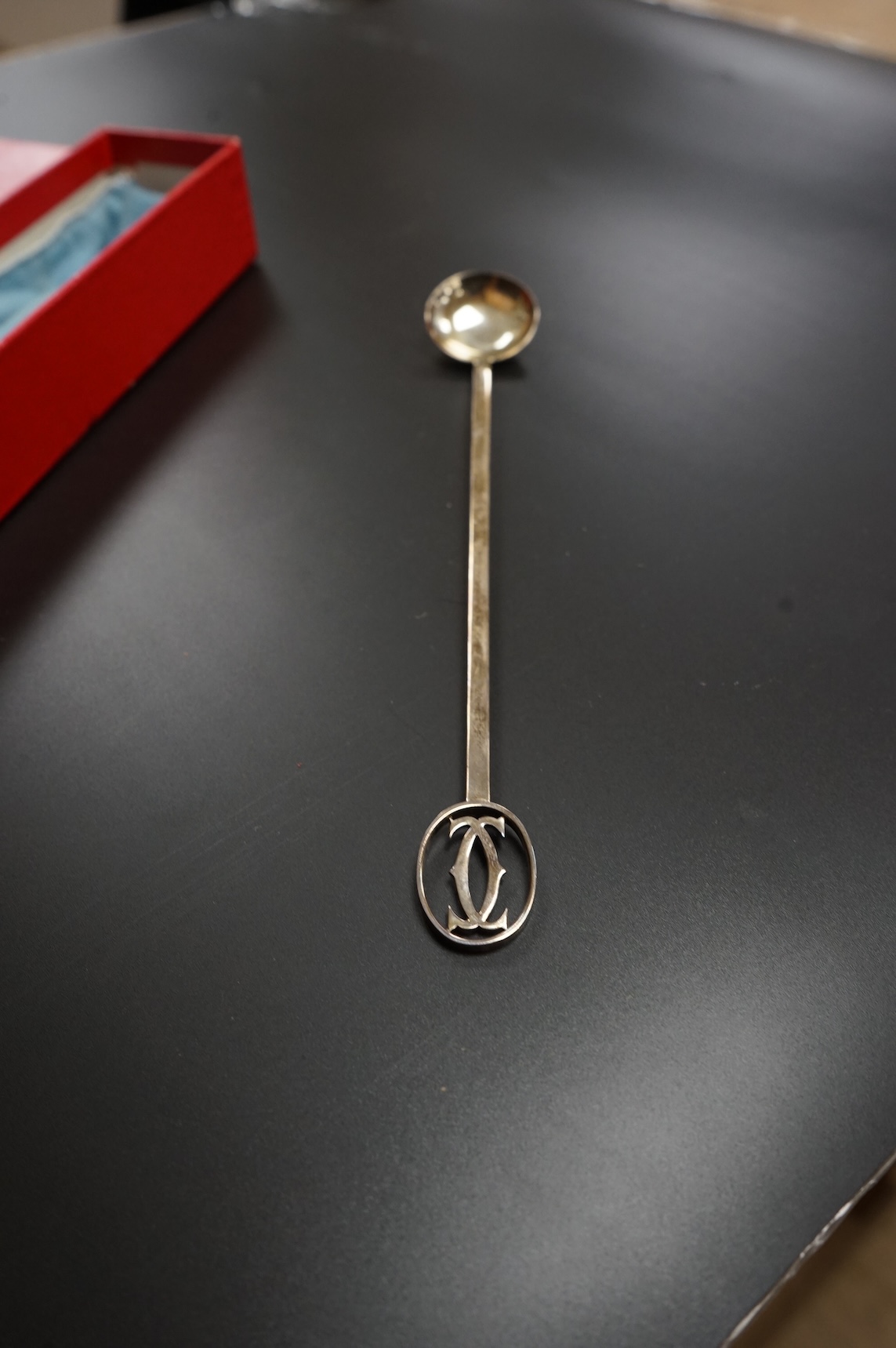 A late 20th century Cartier sterling cocktail stirring spoon, 22.7cm, 33 grams, with Cartier pouch and box.